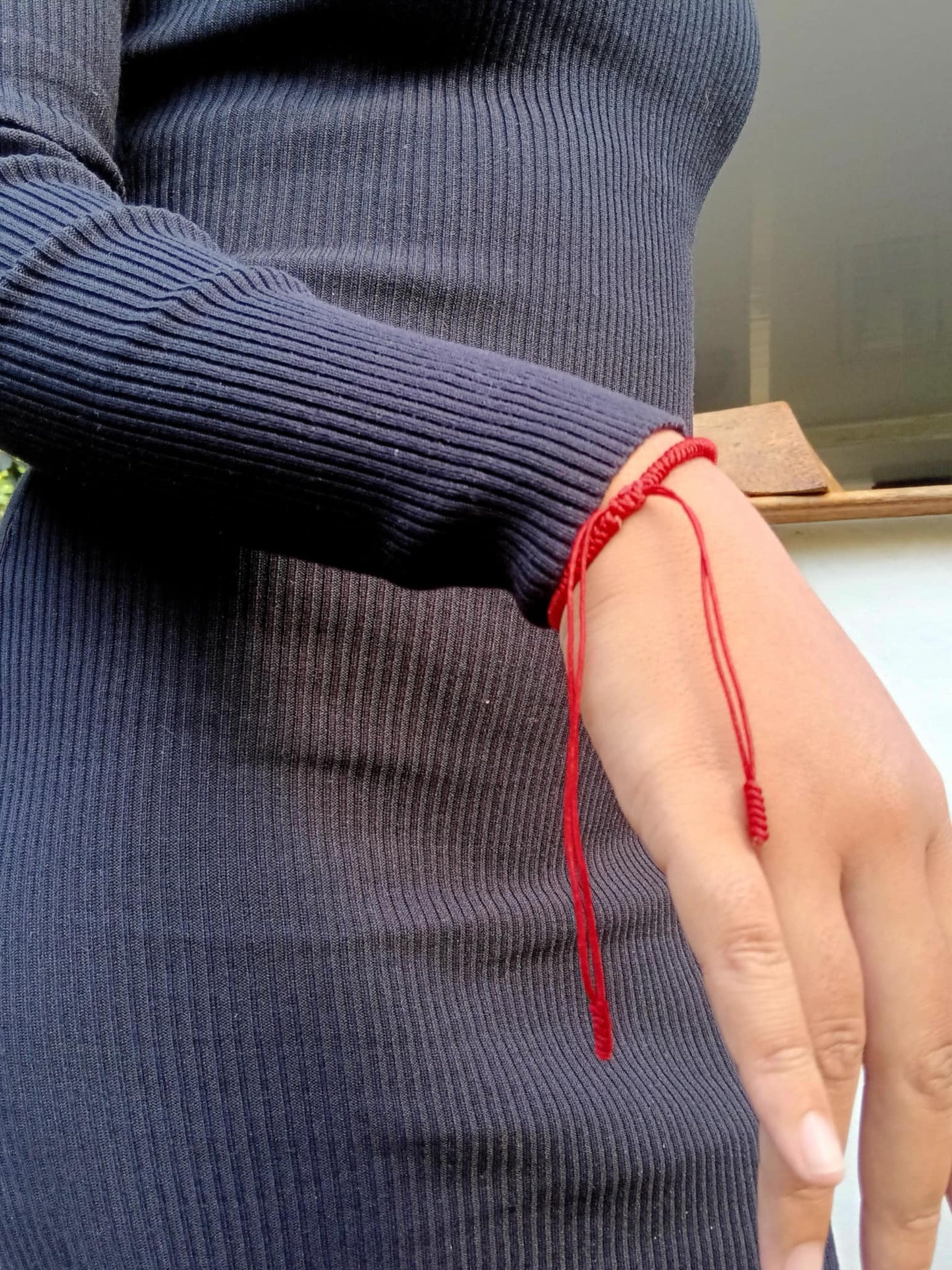 Le bracelet rouge